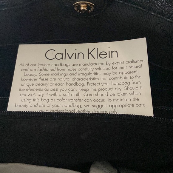Calvin Klein used black leather bag.  Two short straps and one long strap. - Picture 4 of 4
